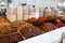 Dried apricots and various nuts in bags and boxes at the Chorsu market in Tashkent, Uzbekistan