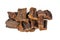 Dried beef lung pieces, an easy to chew and nearly fat free natural healthy dog treat on white background