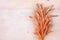 Dried bread spikes on a wooden table. Autumn harvest of bread