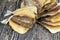 dried and butchered small fish on a wooden table