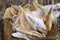 dried and butchered small fish on a wooden table