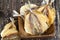 dried and butchered small fish on a wooden table