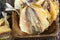 dried and butchered small fish on a wooden table