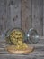 Dried calendula flowers for brewing medicinal tea on a wooden ancient table. Health and medicine