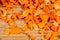 Dried carrots on a wooden surface, close-up, macro.