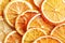 Dried citruses closeup as background. Top view. Place for text. Pattern.