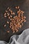 Dried cocoa beans. Cacao beans on kitchen table