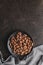 Dried cocoa beans. Cacao beans on plate