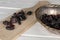 Dried cowberry on grey wood