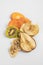 Dried dehydrated fruit chips isolated on a white background. Homemade Dried Fruit Slices, Sweet Snack, Vegan Vegetarian Food