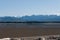 Dried Dungeness Bay in front of mountain background at Dungeness Spit, Olympic Peninsula, USA