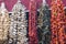 Dried eggplants, peppers and other vegetables hanging on strings at bazaar in Istanbul,