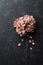 Dried flowers hydrangea on black vintage table top view. Flat lay styling.