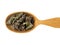 Dried flowers of Stachys officinalis in a wooden spoon on a white background
