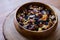 Dried Fruit Walnut, fig, palm, mulberry, date in a wooden bowl