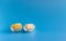 Dried fruits in assortment  in glass cups on a blue background. The concept of a healthy lifestyle