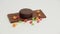 Dried fruits, chocolate and chocolate cake on a white background