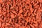 Dried goji berries closeup food background texture