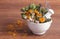 Dried herbs and flowers in white mortar, herbalism, decoration