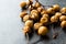 Dried Immature Unripe Dry Yellow Dates from Palm Tree with Stalks