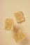 Dried instant noodles on beige background. top view