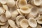 Dried italian orecchiette pasta food background