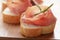 Dried jamon slices on wood table, spanish food