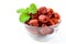 Dried Jujube, Chinese dried red date fruit with Mint leaves in glass cup isolated on white,herbal fruits