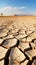 Dried land in the desert Cracked soil crust climate change