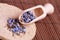 Dried lavender petals on the wooden spoon