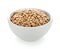 Dried lentils in a bowl on white background