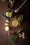 Dried mountain tea, turmeric, cinnamon sticks, lemon slices and jar of honey on wooden background.  Sideritis Scardica.