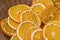 Dried orange slices in a wicker basket. Dehydrated citrus wheels
