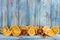 Dried oranges on wooden background, Christmas or New Year background, template greeting card