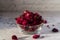 Dried organic pink rose buds in on white table background