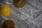 Dried organic spice powders on a marble kitchen worktop background photographed from above