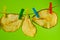 Dried pear chips, closeup shot on a green background. Background for a healthy diet