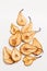 Dried pear slices on white background