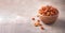 Dried physalis in wooden bowl on wood textured background. Copy space. Superfood, vegan, vegetarian food concept. Macro of inca