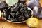 Dried plums prunes and fresh berries