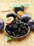 Dried plums prunes and fresh berries