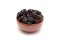 Dried prunes in bowl