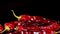 Dried red chilly peppers on dark background. Red pepper harvest.