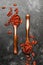Dried red goji berries on gray background - useful and healthy food concept, flat layout with the place for text, top view