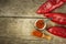 Dried red pepper. Traditional spices. Kitchen table with dried and fresh pepper. Seasoning food.