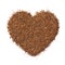 Dried rooibos, bush tea, red tea, redbush tea leaves in heart shape on white background close up