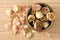 Dried rosebuds in teacup and petals top view