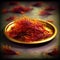 Dried saffron threads on a golden plate