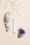 dried sage, selenite and druse amethyst on beige background