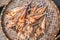 Dried salted fishes on brown basketry